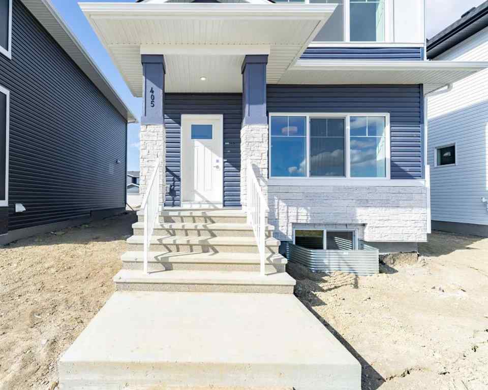 MLS® A2213236 - 405 Dawson Wharf Road  in Dawson\'s Landing Chestermere, Residential