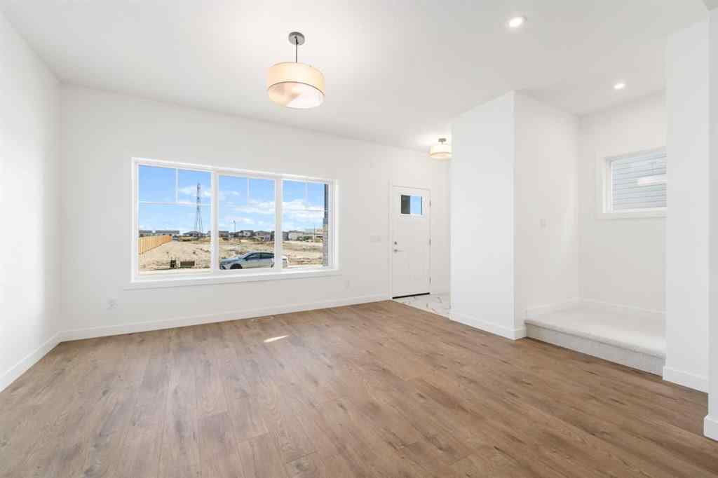 MLS® A2213236 - 405 Dawson Wharf Road  in Dawson\'s Landing Chestermere, Residential