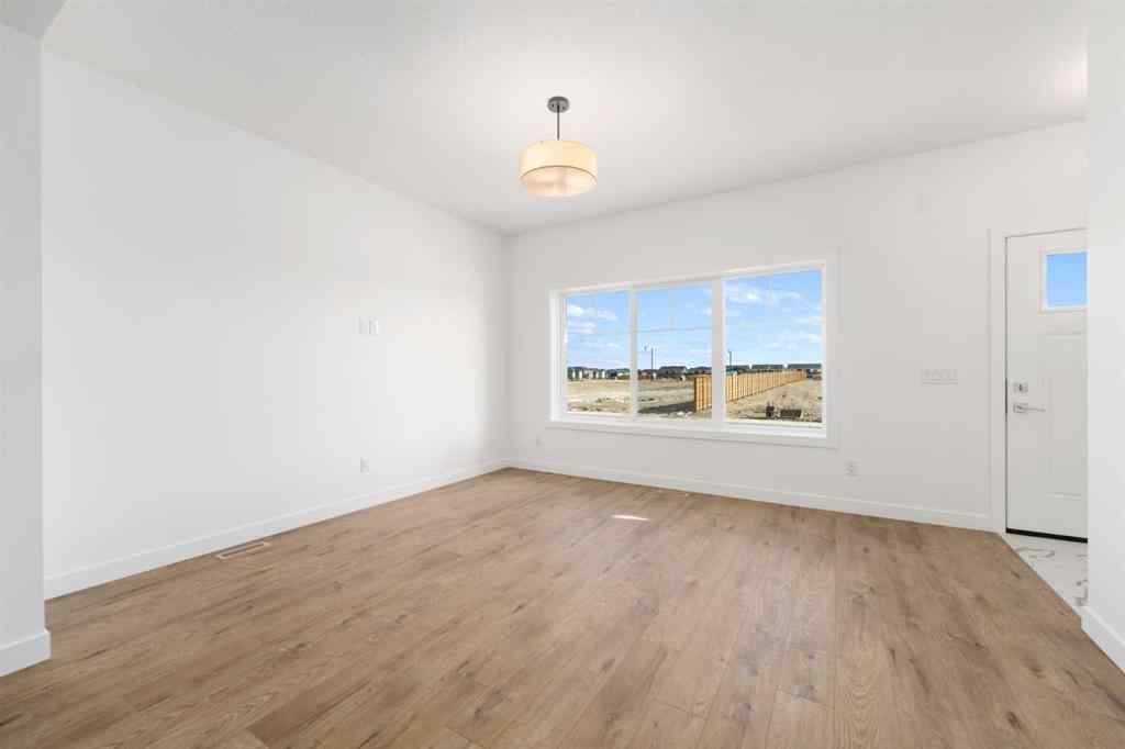 MLS® A2213236 - 405 Dawson Wharf Road  in Dawson\'s Landing Chestermere, Residential