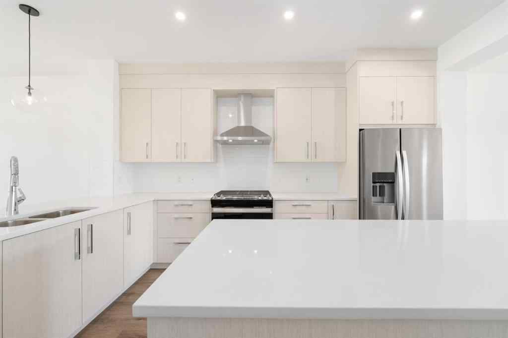 MLS® A2213236 - 405 Dawson Wharf Road  in Dawson\'s Landing Chestermere, Residential