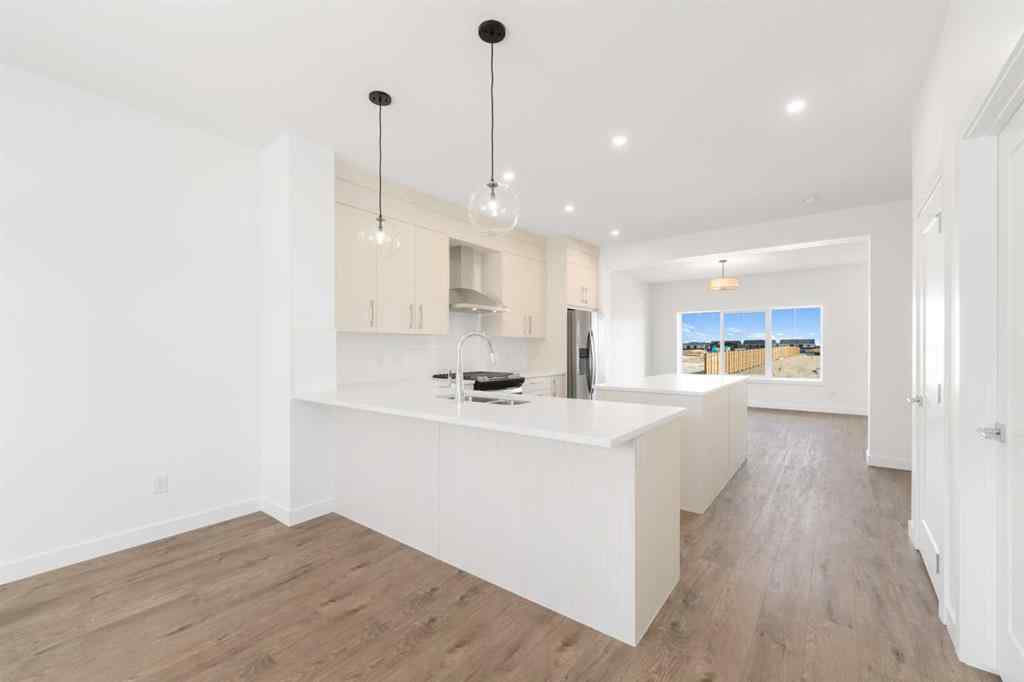 MLS® A2213236 - 405 Dawson Wharf Road  in Dawson\'s Landing Chestermere, Residential