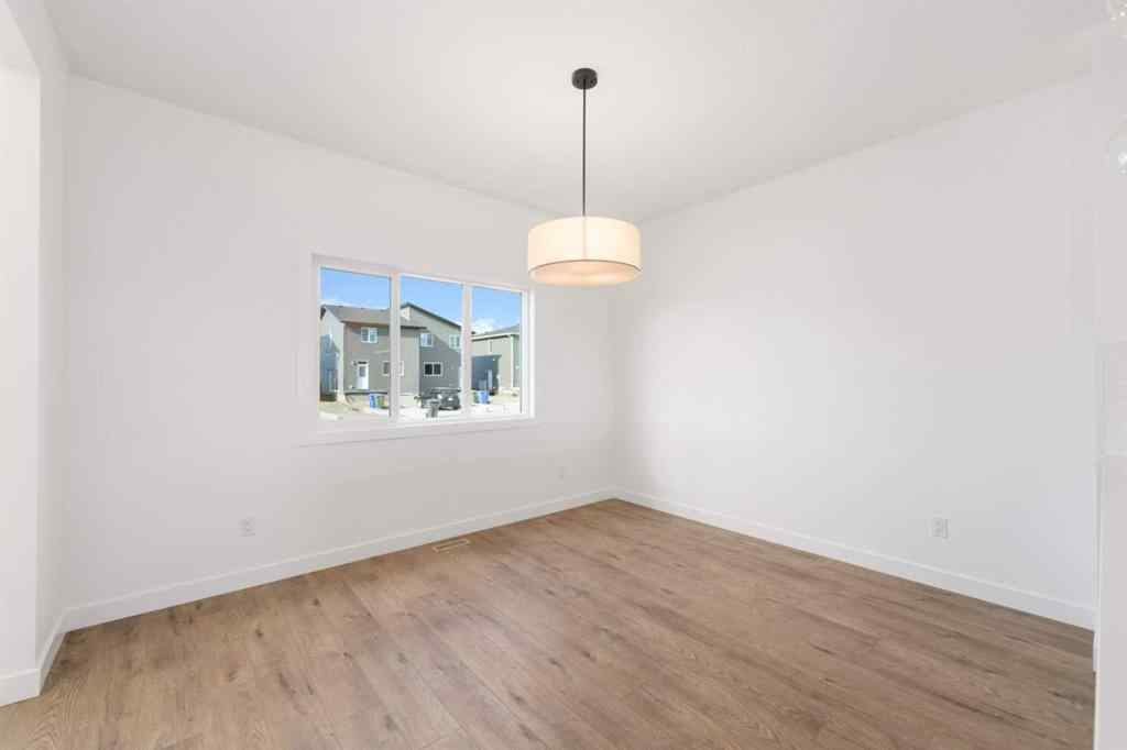 MLS® A2213236 - 405 Dawson Wharf Road  in Dawson\'s Landing Chestermere, Residential