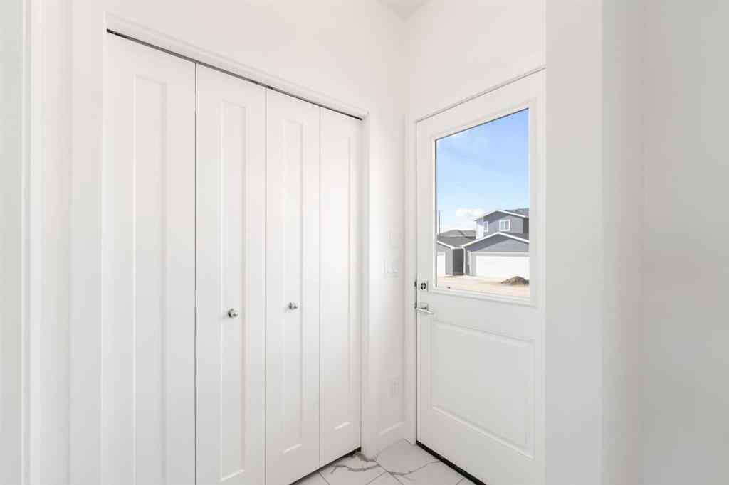 MLS® A2213236 - 405 Dawson Wharf Road  in Dawson\'s Landing Chestermere, Residential