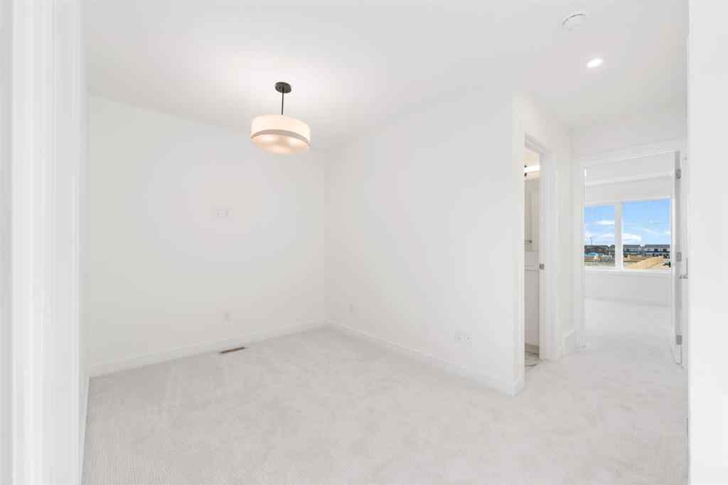 MLS® A2213236 - 405 Dawson Wharf Road  in Dawson\'s Landing Chestermere, Residential