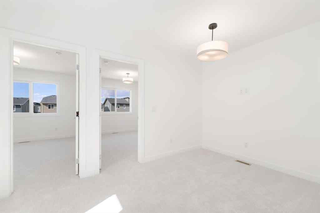 MLS® A2213236 - 405 Dawson Wharf Road  in Dawson\'s Landing Chestermere, Residential