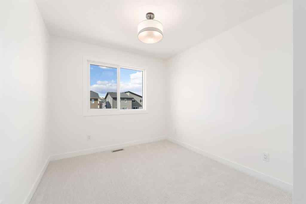 MLS® A2213236 - 405 Dawson Wharf Road  in Dawson\'s Landing Chestermere, Residential