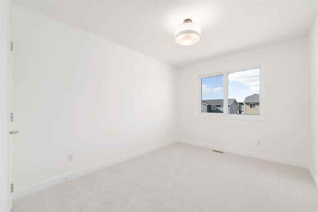 MLS® A2213236 - 405 Dawson Wharf Road  in Dawson\'s Landing Chestermere, Residential