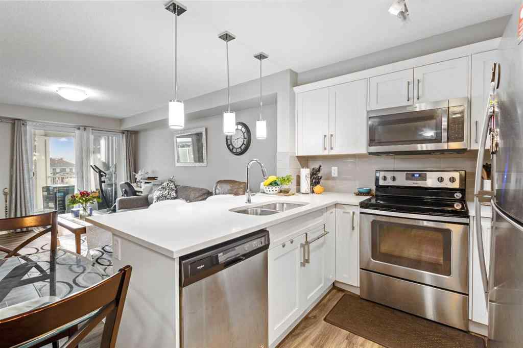 MLS® A2213271 - Unit #201 110 Auburn Meadows View SE in Auburn Bay Calgary, Residential