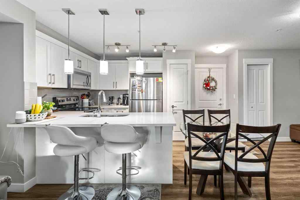 MLS® A2213271 - Unit #201 110 Auburn Meadows View SE in Auburn Bay Calgary, Residential