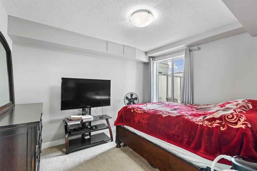 MLS® A2213271 - Unit #201 110 Auburn Meadows View SE in Auburn Bay Calgary, Residential