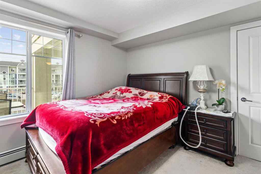 MLS® A2213271 - Unit #201 110 Auburn Meadows View SE in Auburn Bay Calgary, Residential