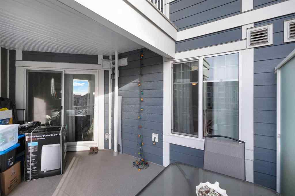 MLS® A2213271 - Unit #201 110 Auburn Meadows View SE in Auburn Bay Calgary, Residential