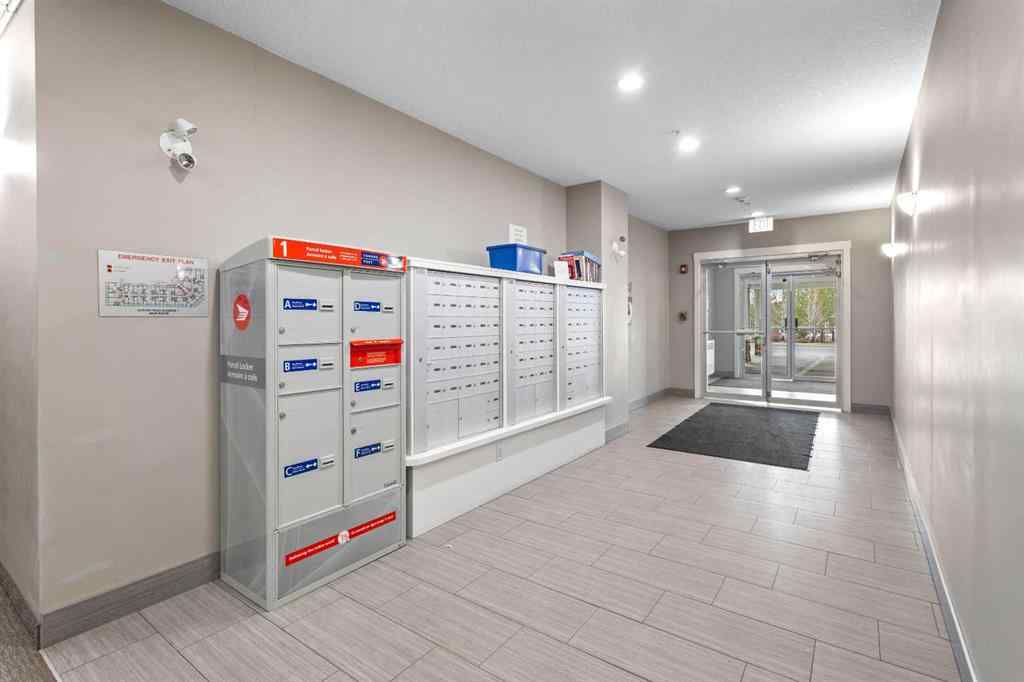MLS® A2213271 - Unit #201 110 Auburn Meadows View SE in Auburn Bay Calgary, Residential