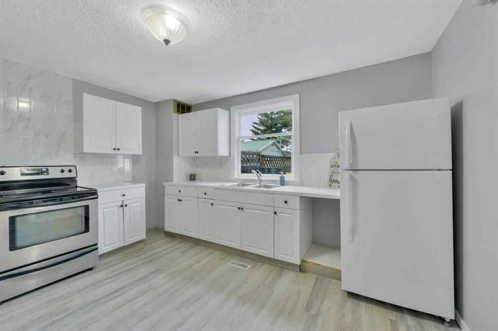 MLS® A2213462 - 5140 48 Street  in Central Innisfail Innisfail, Residential