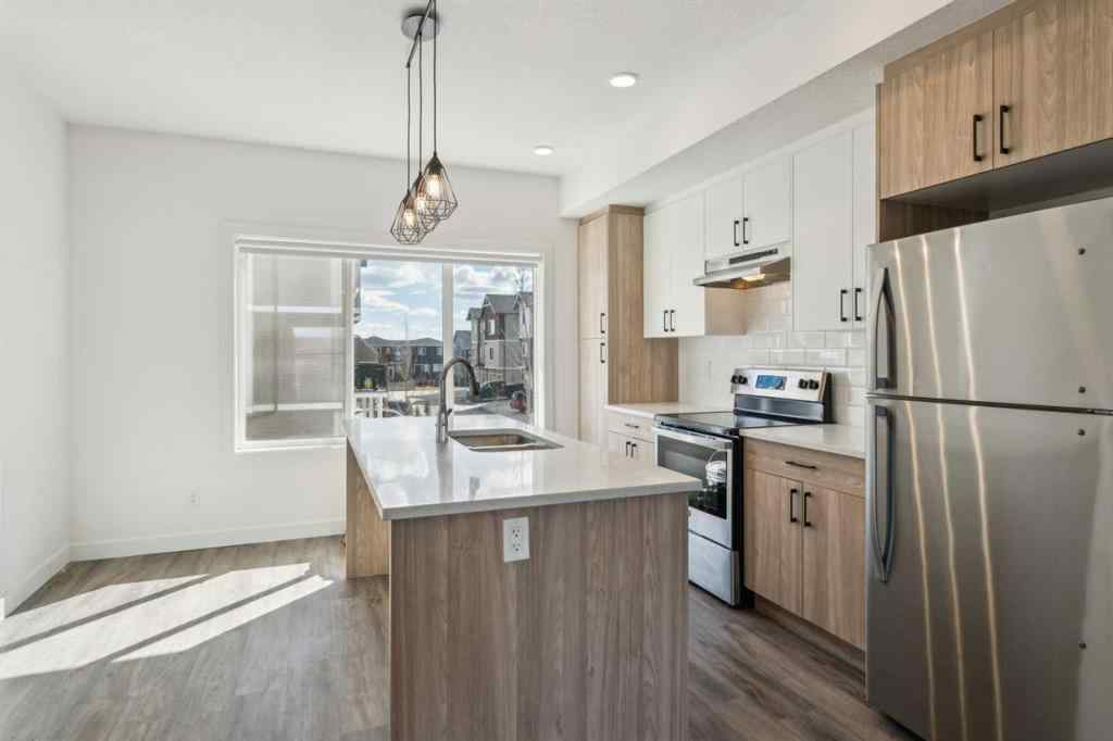 MLS® A2213580 - Unit #204 24 Rivercrest Drive  in Rivercrest Cochrane, Residential
