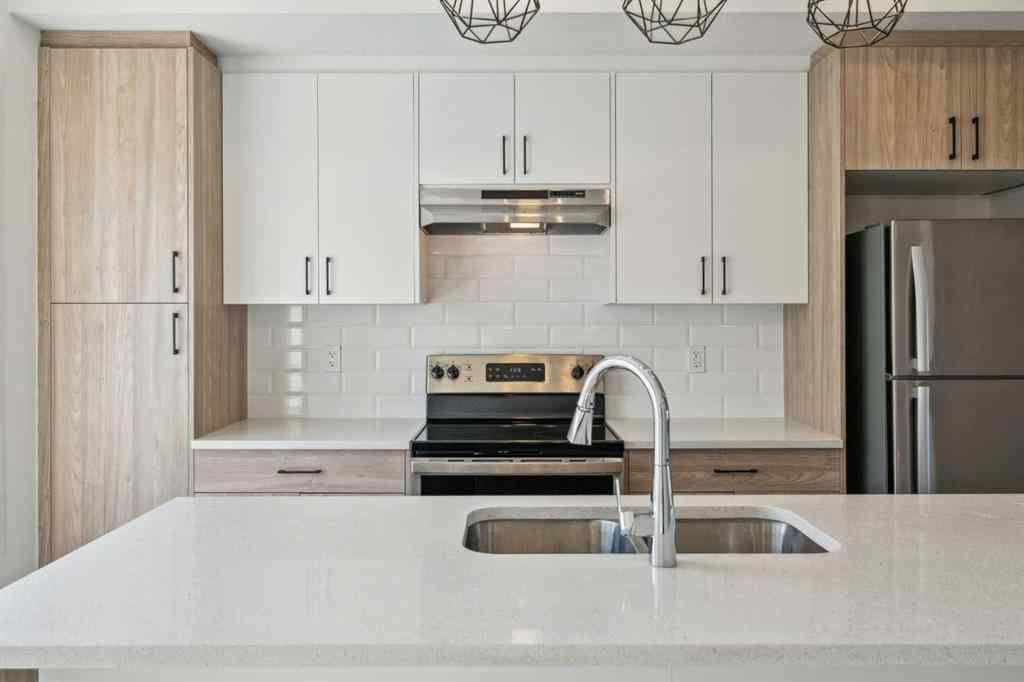 MLS® A2213580 - Unit #204 24 Rivercrest Drive  in Rivercrest Cochrane, Residential