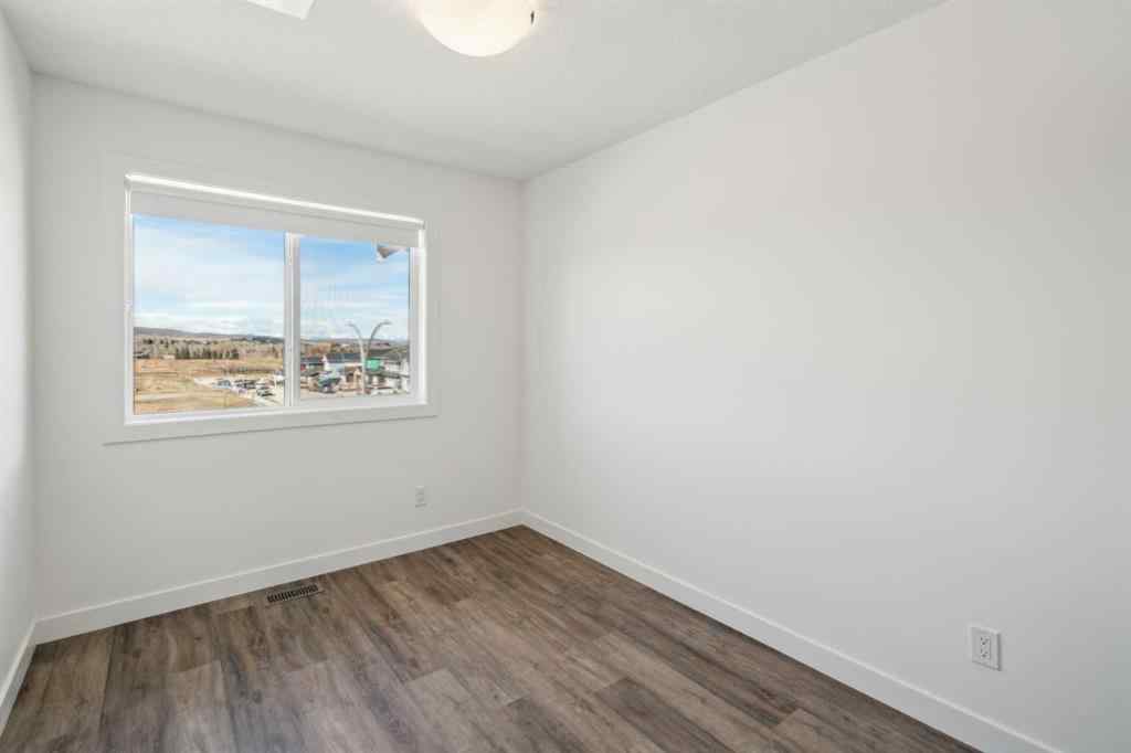 MLS® A2213580 - Unit #204 24 Rivercrest Drive  in Rivercrest Cochrane, Residential