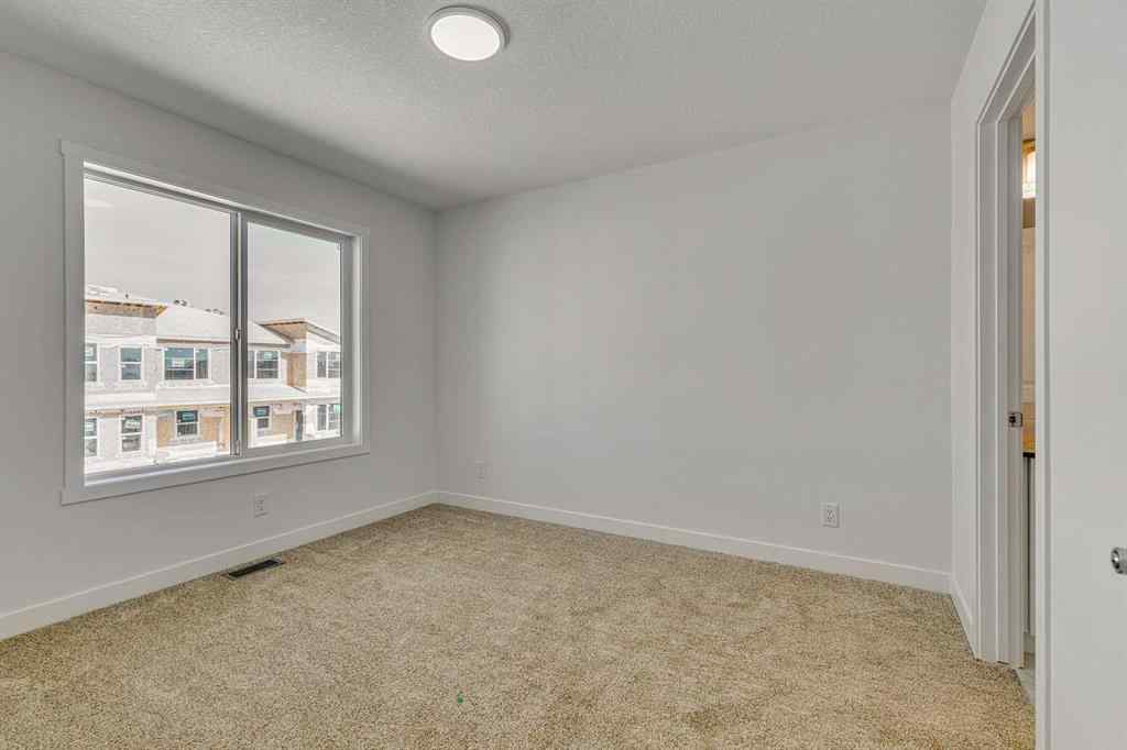 MLS® A2213629 - Unit #303 65 Belvedere Point SE in Belvedere Calgary, Residential