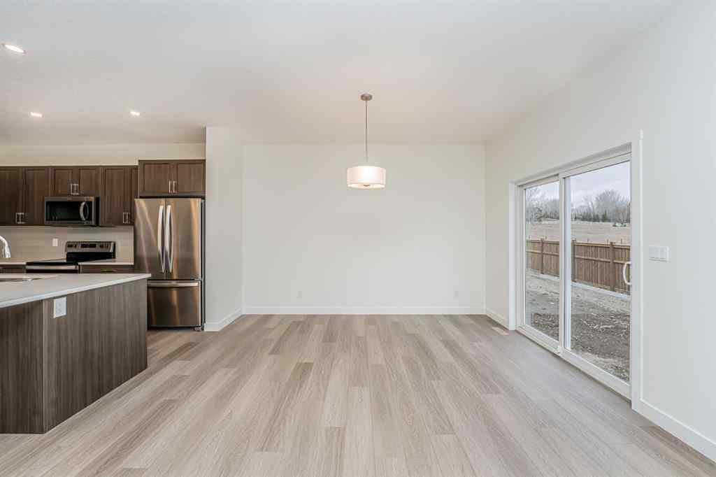 MLS® A2213932 - 254 Baneberry Way SW in Wildflower Airdrie, Residential