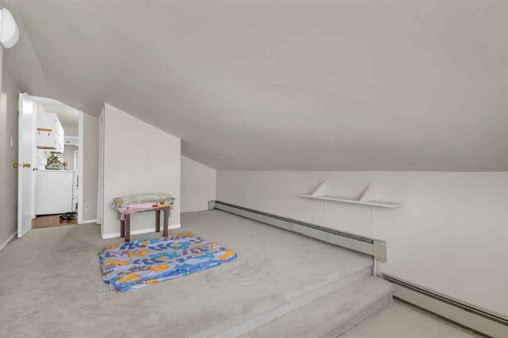 MLS® A2213994 - 4718 College Avenue  in College Heights Lacombe, Multi-Family