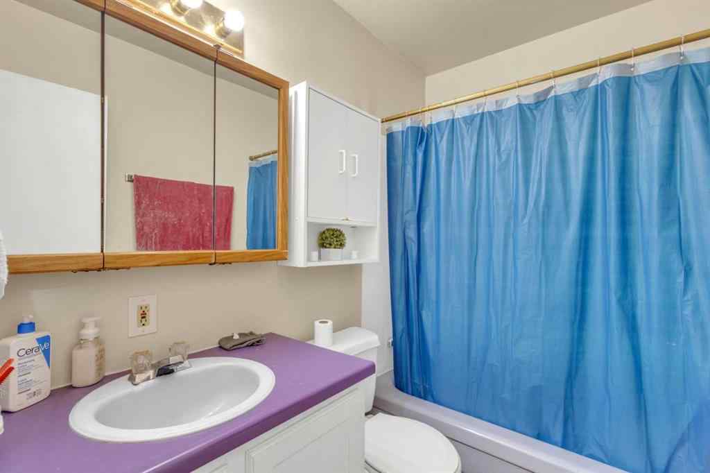 MLS® A2213994 - 4718 College Avenue  in College Heights Lacombe, Multi-Family