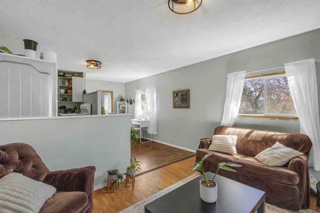 MLS® A2213994 - 4718 College Avenue  in College Heights Lacombe, Multi-Family