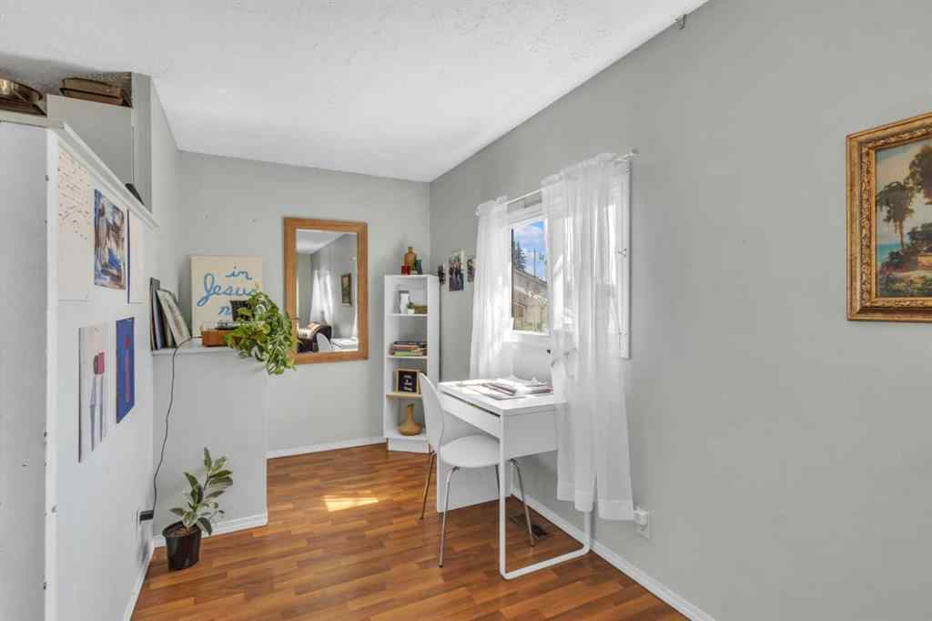 MLS® A2213994 - 4718 College Avenue  in College Heights Lacombe, Multi-Family