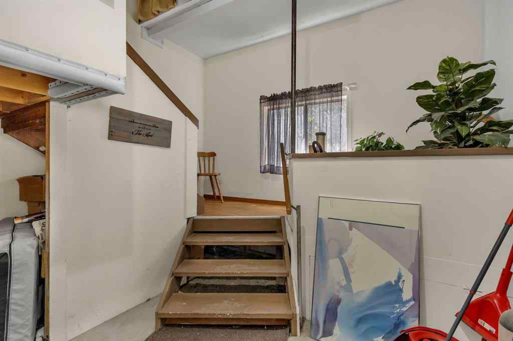 MLS® A2213994 - 4718 College Avenue  in College Heights Lacombe, Multi-Family