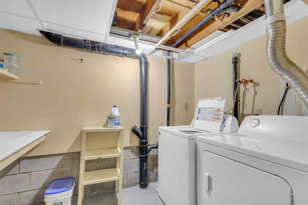 MLS® A2213994 - 4718 College Avenue  in College Heights Lacombe, Multi-Family