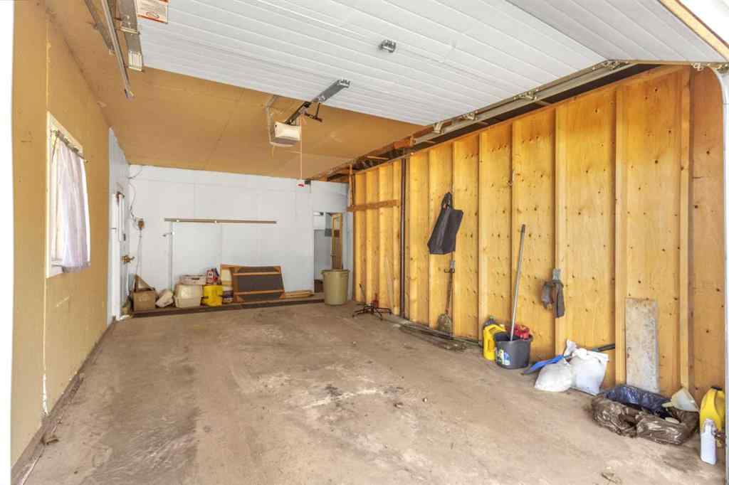 MLS® A2213994 - 4718 College Avenue  in College Heights Lacombe, Multi-Family