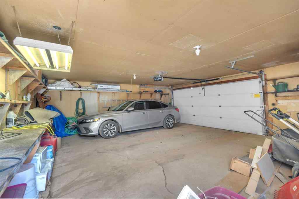 MLS® A2213994 - 4718 College Avenue  in College Heights Lacombe, Multi-Family