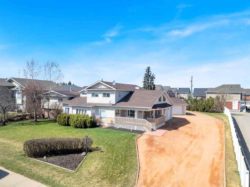 MLS® A2213994 - 4718 College Avenue  in College Heights Lacombe, Multi-Family