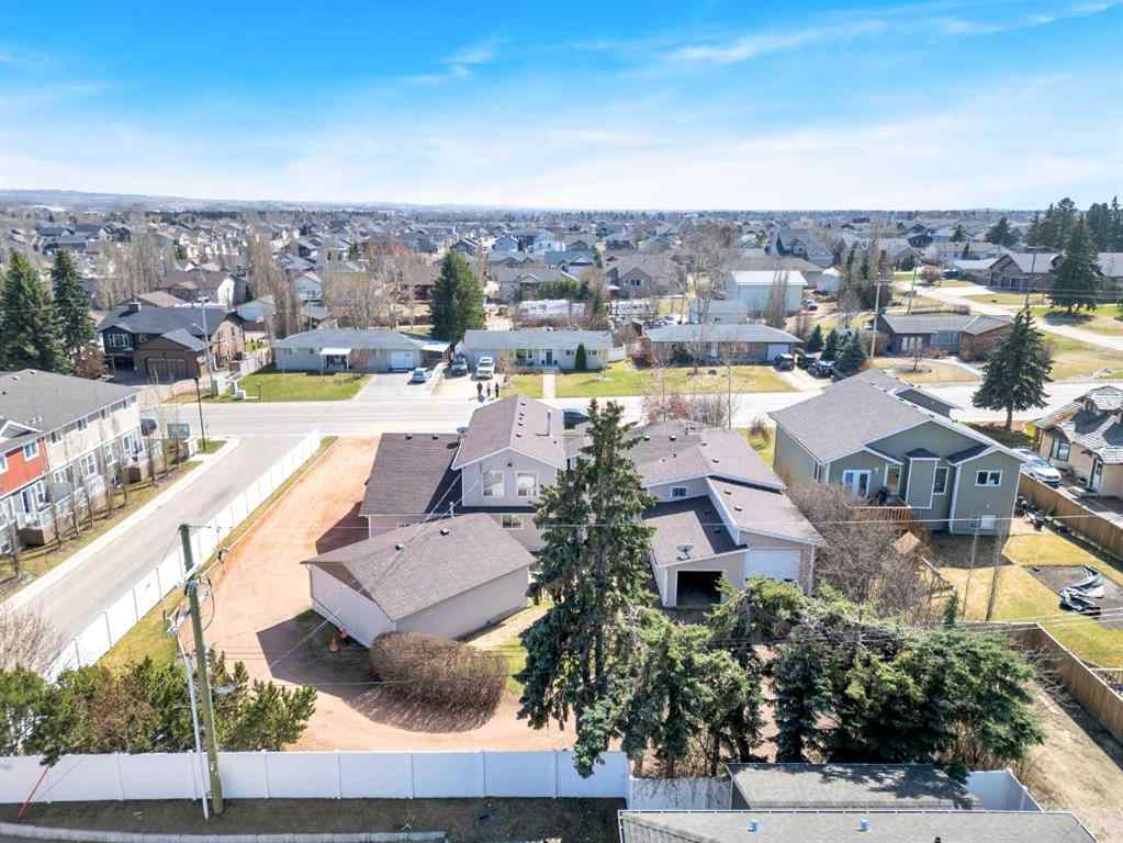 MLS® A2213994 - 4718 College Avenue  in College Heights Lacombe, Multi-Family