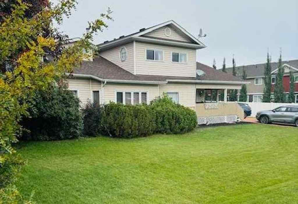 MLS® A2213994 - 4718 College Avenue  in College Heights Lacombe, Multi-Family