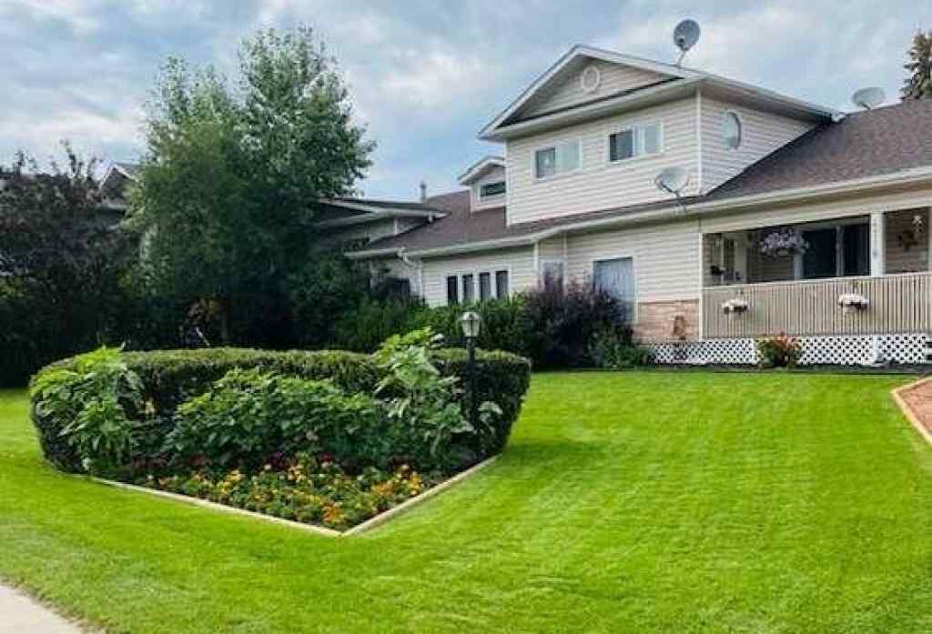 MLS® A2213994 - 4718 College Avenue  in College Heights Lacombe, Multi-Family