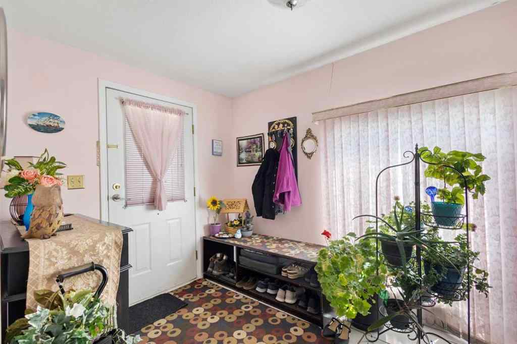 MLS® A2213994 - 4718 College Avenue  in College Heights Lacombe, Multi-Family