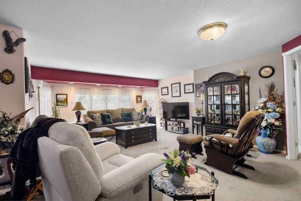 MLS® A2213994 - 4718 College Avenue  in College Heights Lacombe, Multi-Family
