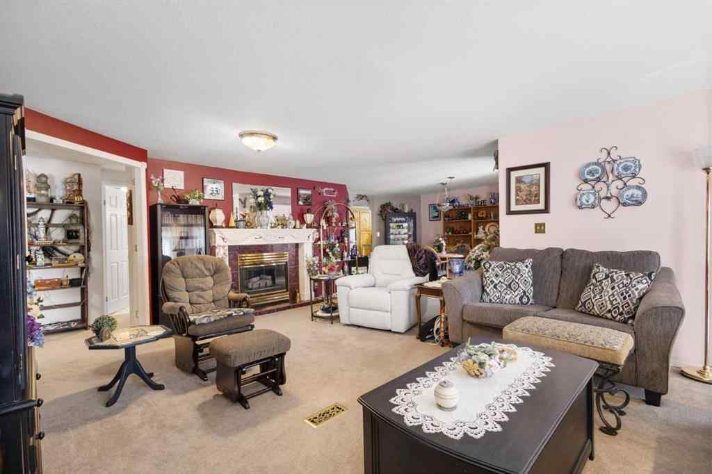MLS® A2213994 - 4718 College Avenue  in College Heights Lacombe, Multi-Family