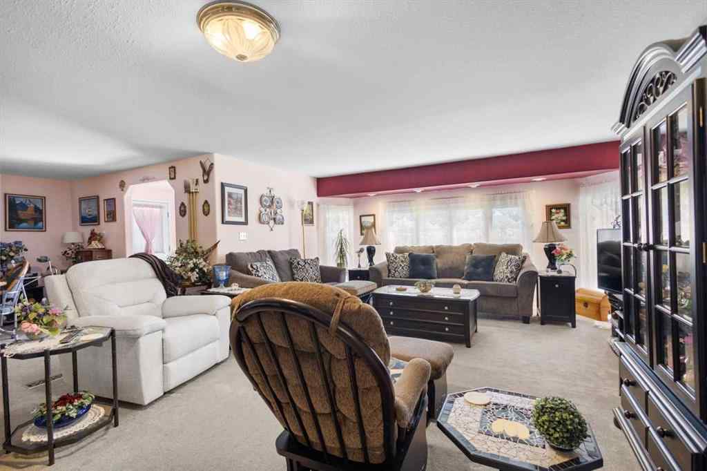 MLS® A2213994 - 4718 College Avenue  in College Heights Lacombe, Multi-Family