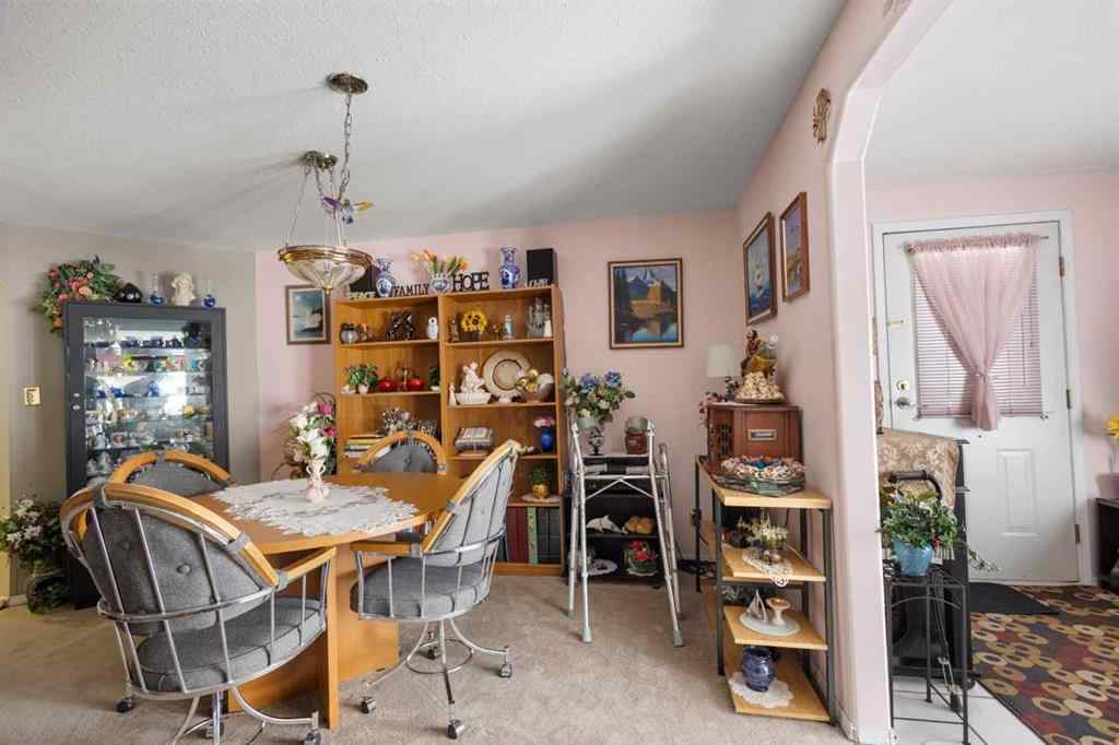 MLS® A2213994 - 4718 College Avenue  in College Heights Lacombe, Multi-Family