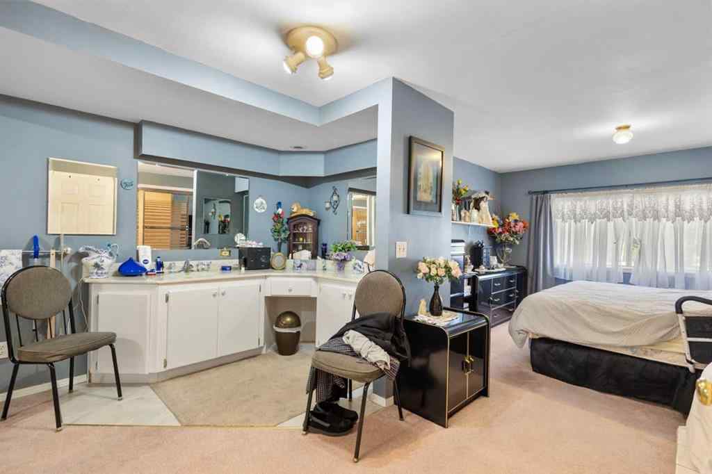 MLS® A2213994 - 4718 College Avenue  in College Heights Lacombe, Multi-Family