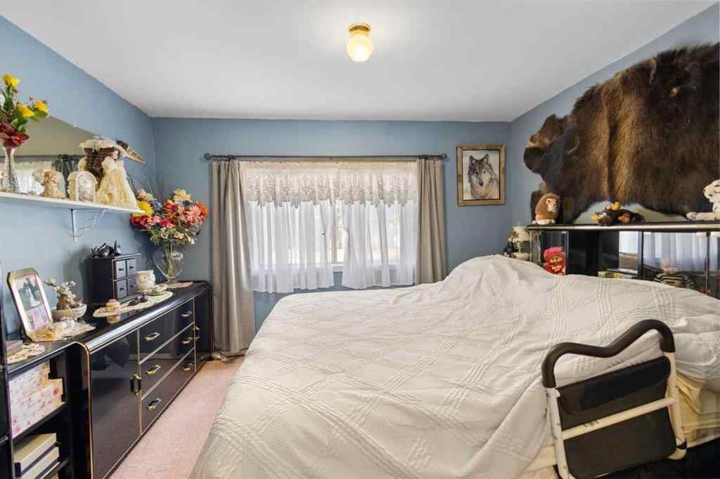 MLS® A2213994 - 4718 College Avenue  in College Heights Lacombe, Multi-Family