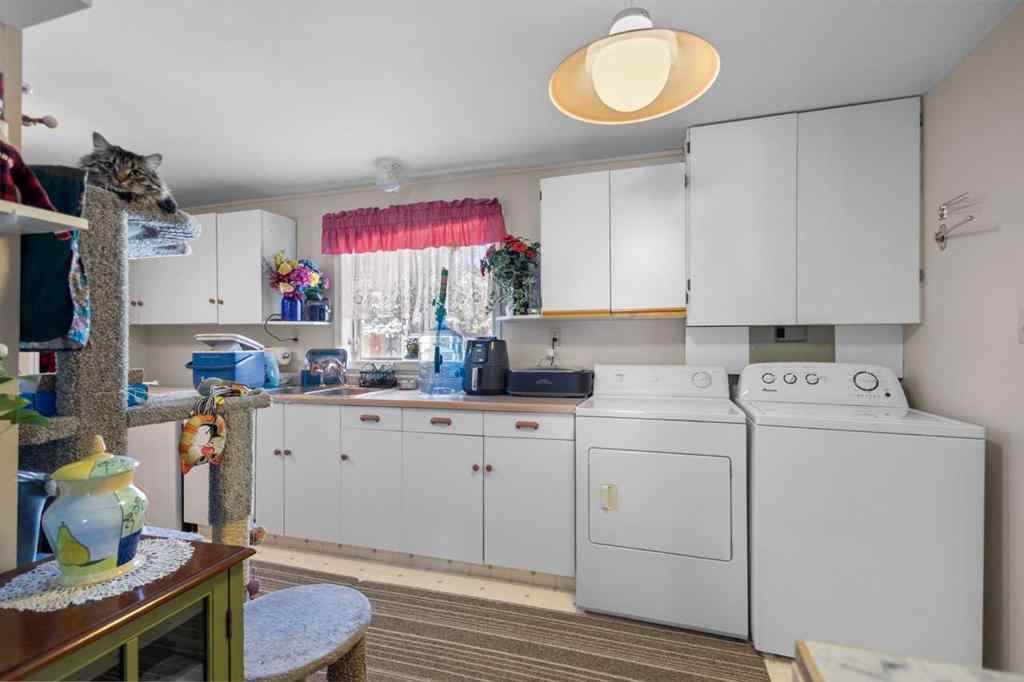 MLS® A2213994 - 4718 College Avenue  in College Heights Lacombe, Multi-Family