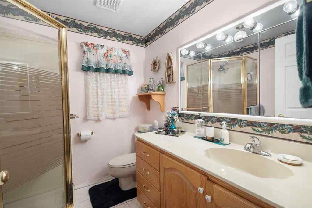 MLS® A2213994 - 4718 College Avenue  in College Heights Lacombe, Multi-Family