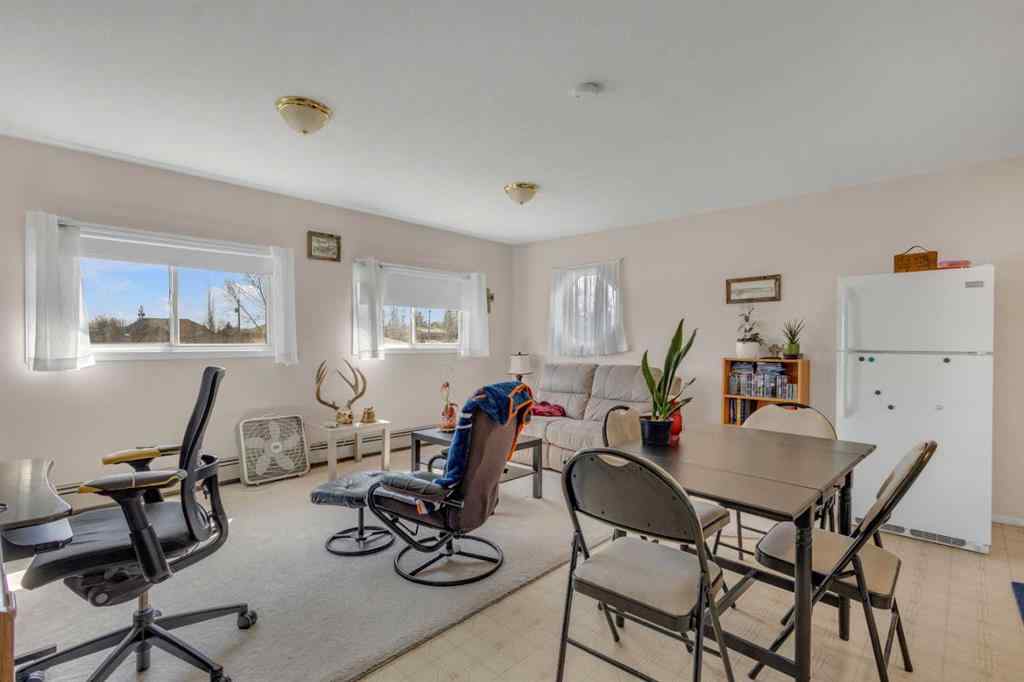MLS® A2213994 - 4718 College Avenue  in College Heights Lacombe, Multi-Family