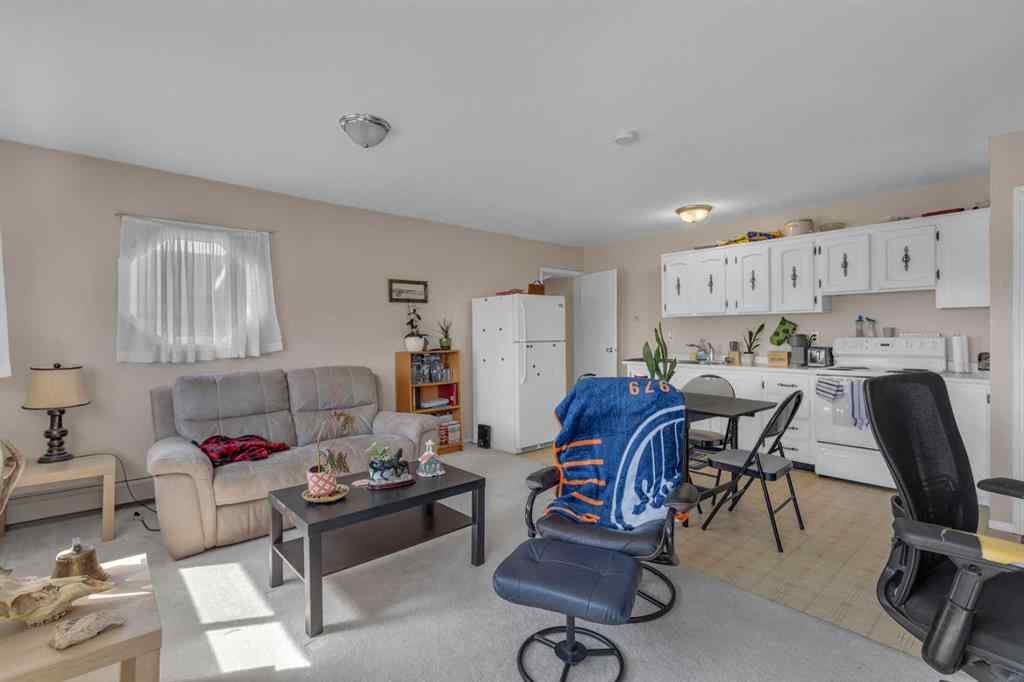MLS® A2213994 - 4718 College Avenue  in College Heights Lacombe, Multi-Family