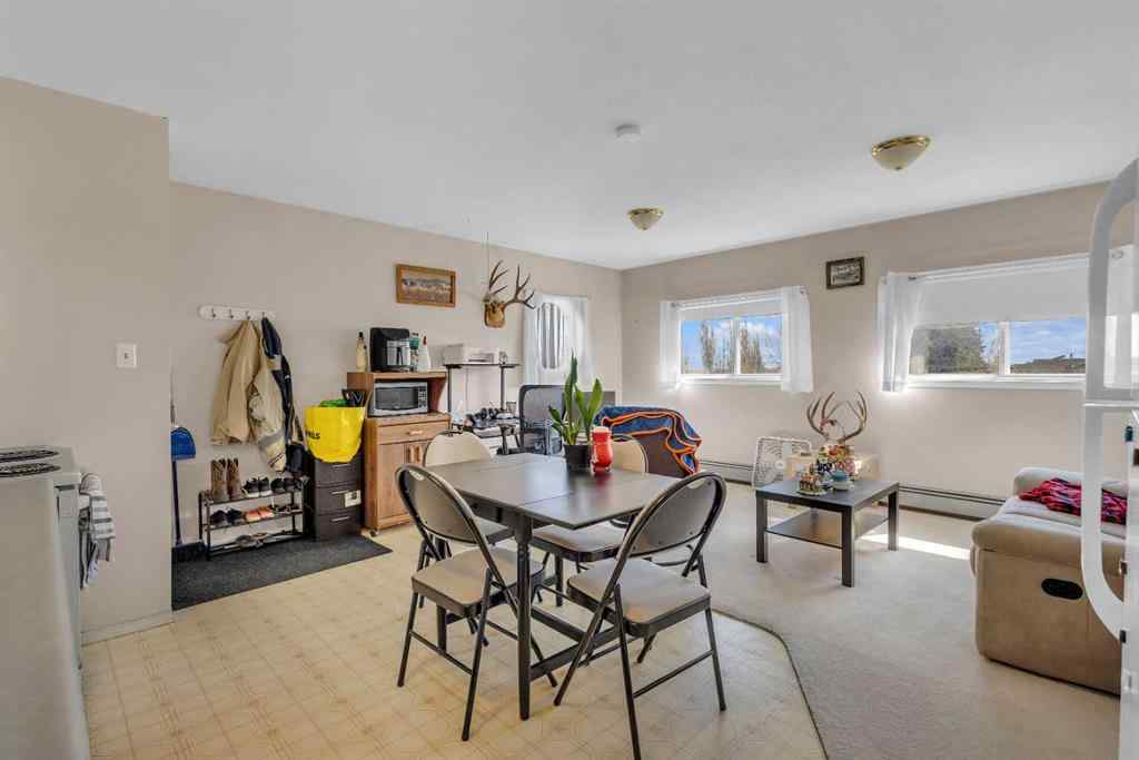 MLS® A2213994 - 4718 College Avenue  in College Heights Lacombe, Multi-Family
