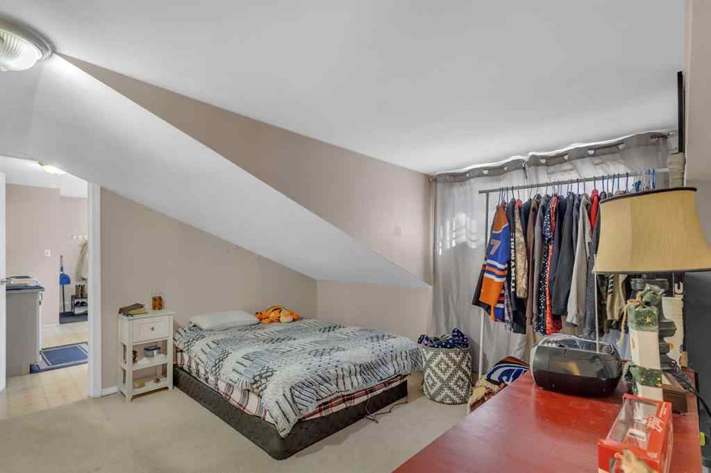 MLS® A2213994 - 4718 College Avenue  in College Heights Lacombe, Multi-Family