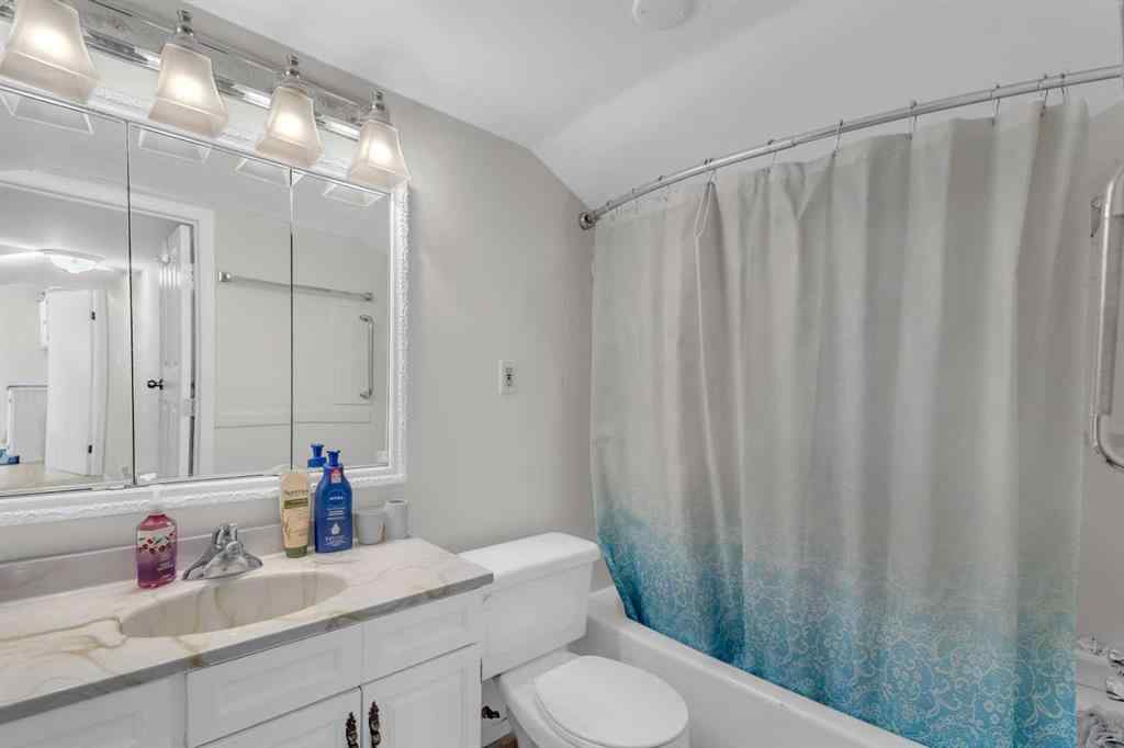 MLS® A2213994 - 4718 College Avenue  in College Heights Lacombe, Multi-Family