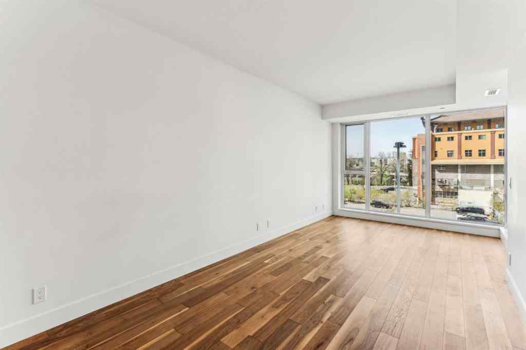 MLS® A2214218 - Unit #410 1025 5 Avenue SW in Downtown West End Calgary, Residential